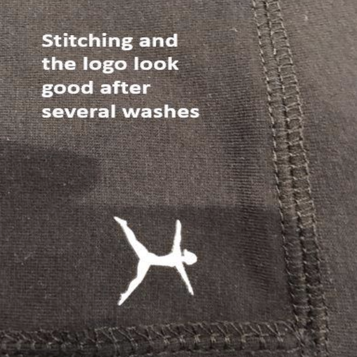 close-up of pants labeled "stitching and the logo look good after several washes" 