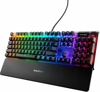 the keyboard with a wrist rest glowing in rainbow colors