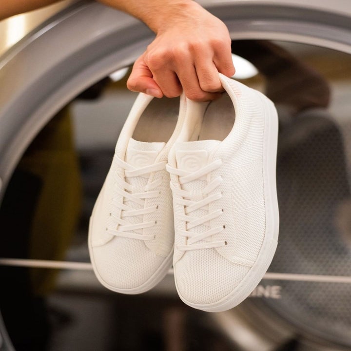 the white lace-up sneakers