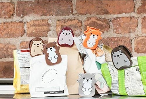 open snack bags with the animal-style clips on them to keep them shut