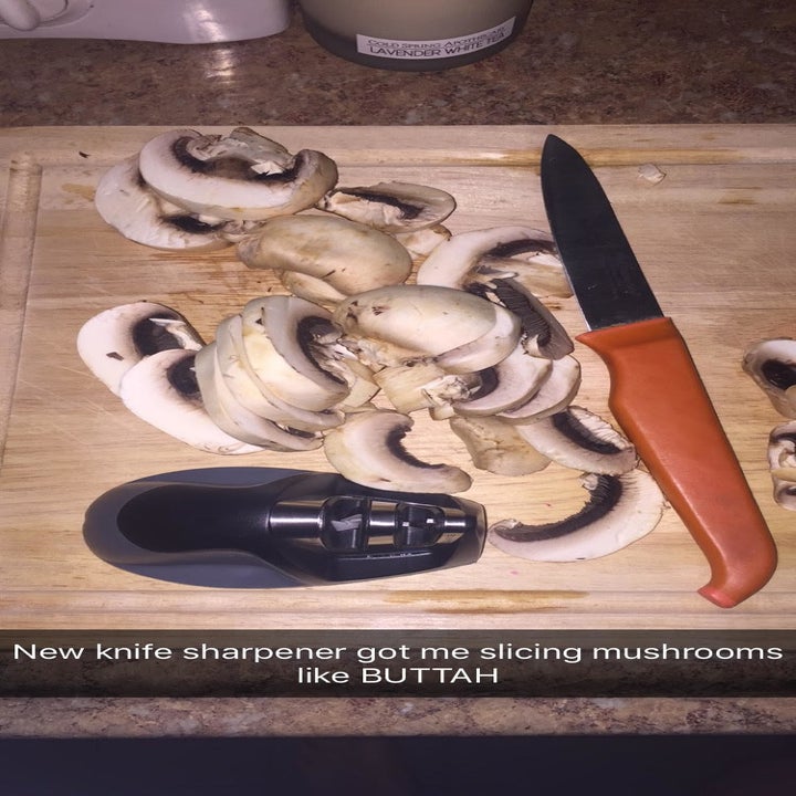 buzzfeed editor cutting mushrooms after sharpening her knife
