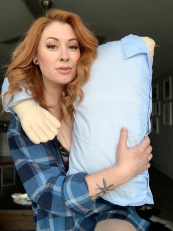 Reviewer posing with the pillow