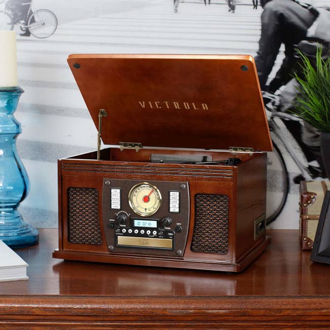 The retro music system with a hinged top record player