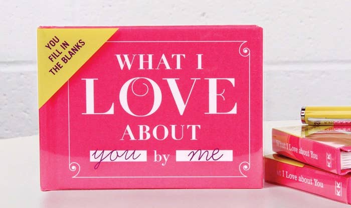 Small pink book called &quot;What I Love About You by Me&quot; and the message &quot;You fill in the blanks&quot; in the upper-left corner.  