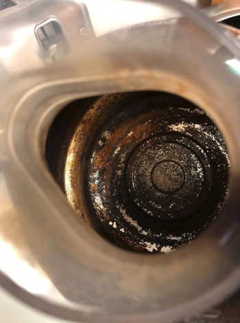 Reviewer image of dirty coffee pot before using the tablets