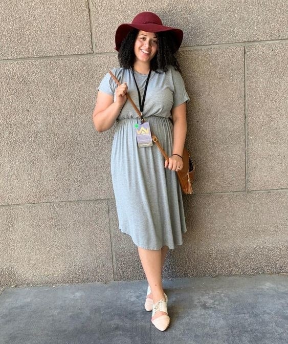 Reviewer wearing the dress in gray 