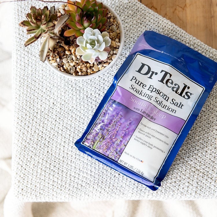 A flatlay of a large bag of lavender-scented epsom salts