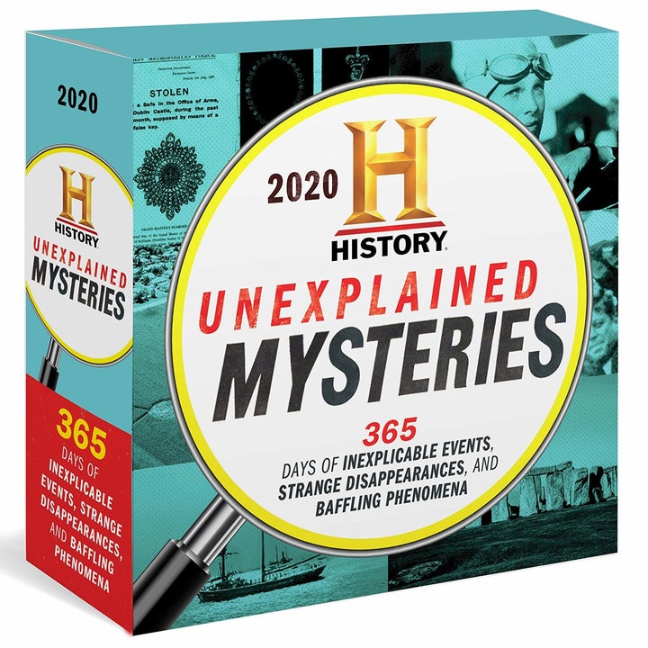 the boxed calendar labeled "Unexplained Mysteries" 