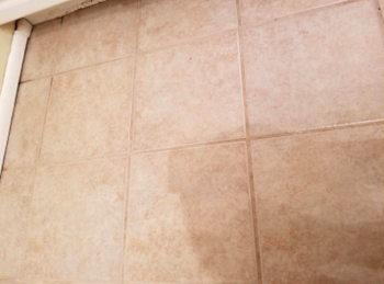 tile floor with light beige clean grout