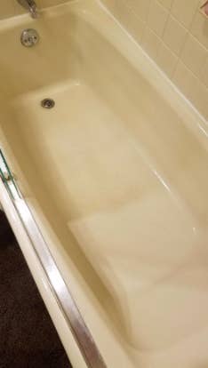 reviewer's clean bathtub floor