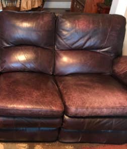worn looking brown leather couch