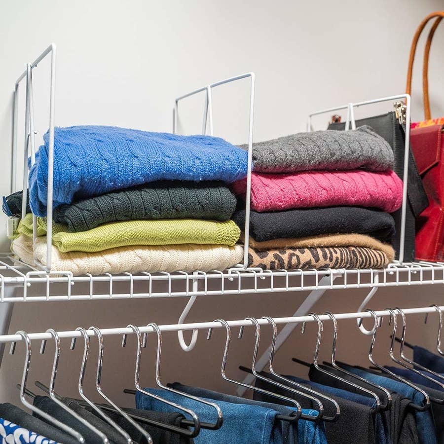 Shelf dividers allow for more organized stacking clothes