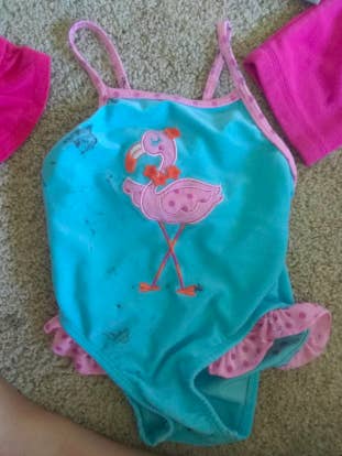 child swimsuit with stain