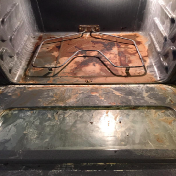 reviewer before pic of inside of oven with stuck on grime