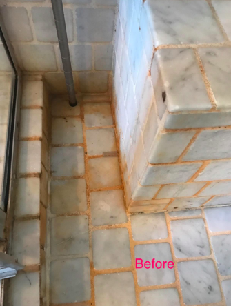 tiled shower with mold on grout