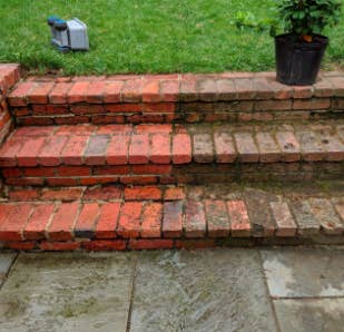 brick steps half clean and half caked in mud
