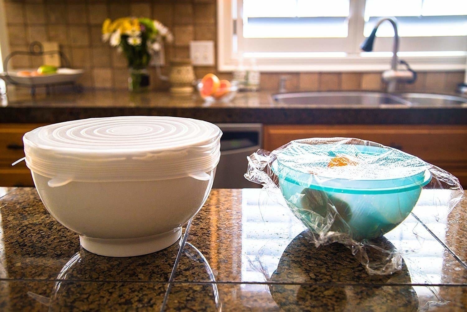 a bowl with the stretch lid on the left and on the right is a bowl with plastic wrap that is not holding tight like the stretch lid