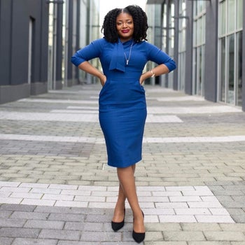 Reviewer wearing the dress in blue