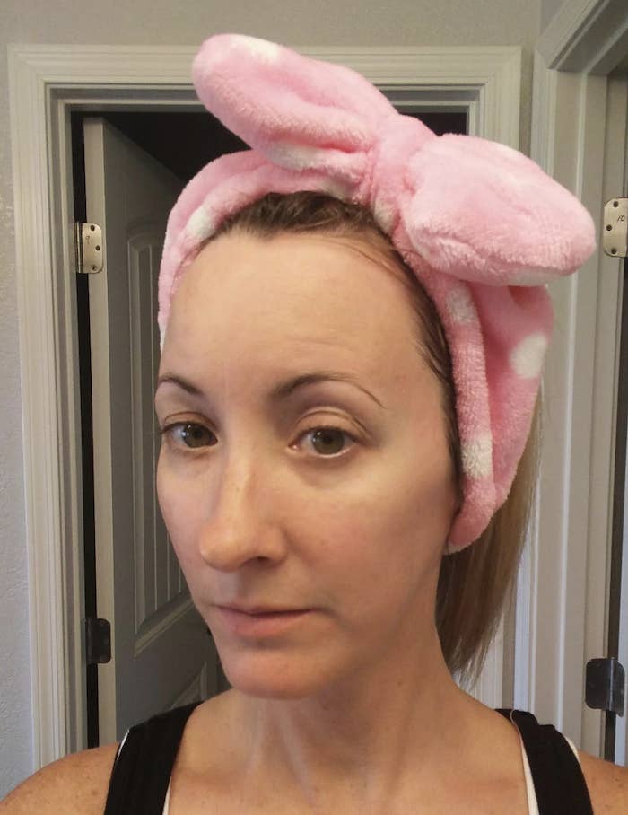 Reviewer wearing pink headband