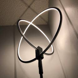 Different review image with circle lights crossing between each other 