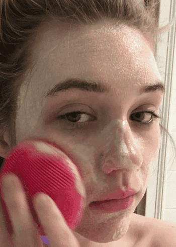 a video of buzzfeed writer maitland cleaning her face with the foreo luna mini 2