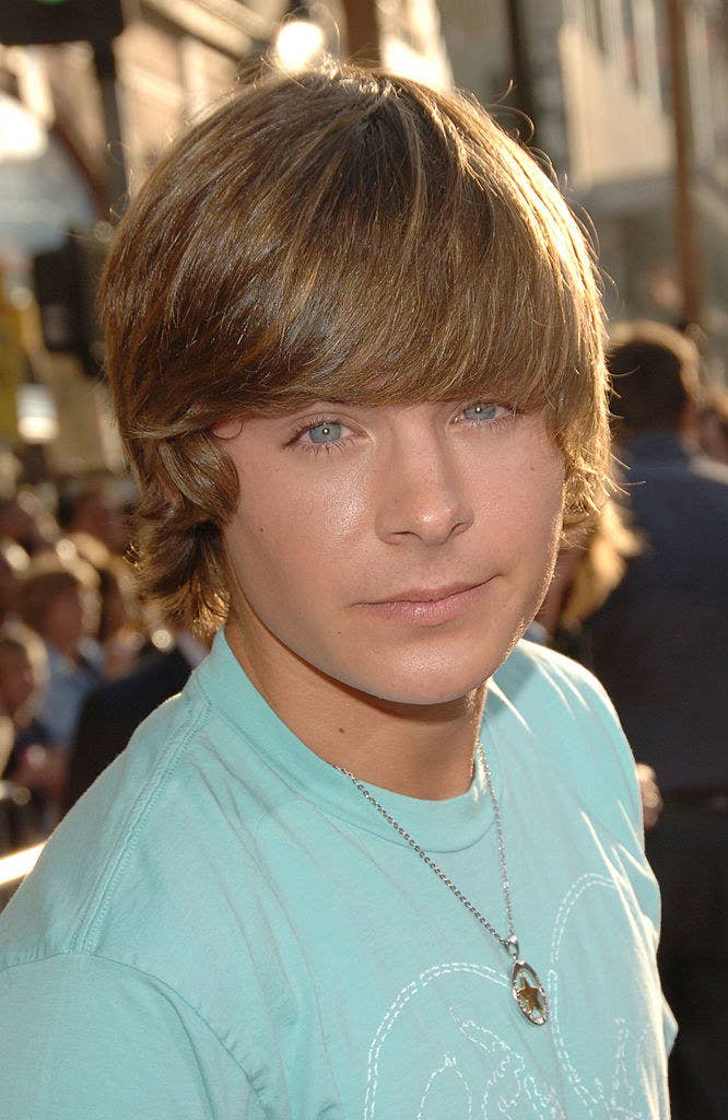 Zac Efron with  long bangs