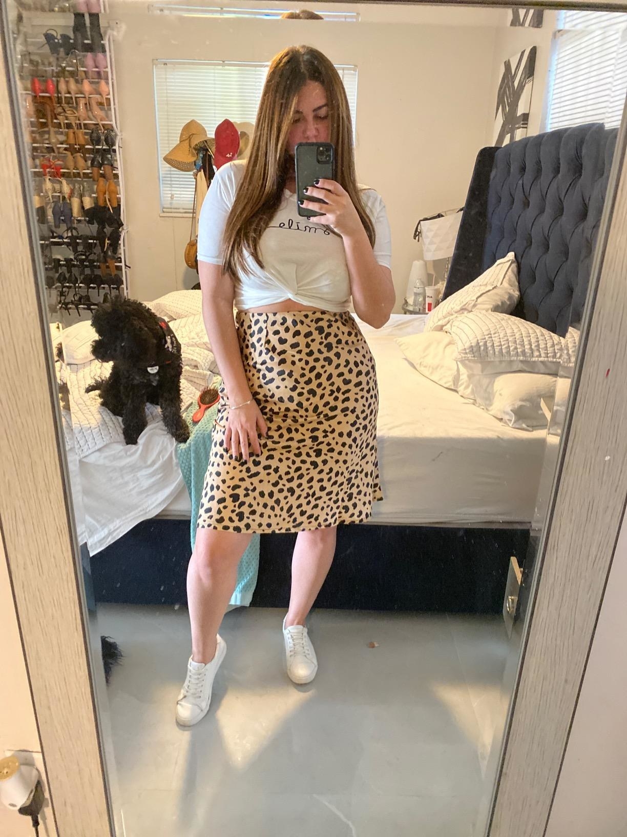 Reviewer in the leopard print skirt