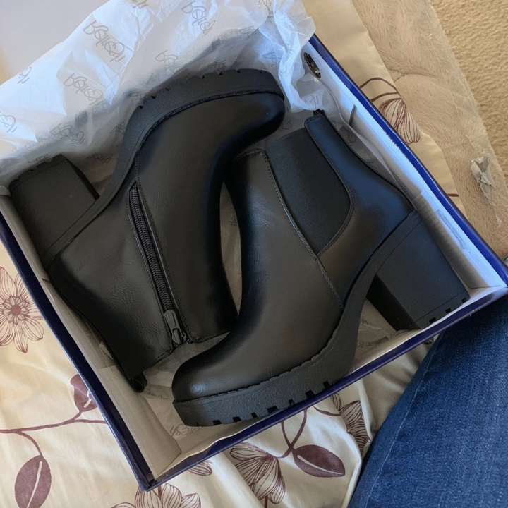 the black boots in the shoe box 