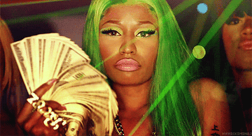 Nicki Minaj waving money.