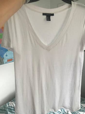 the same T-shirt with almost all of the wrinkles gone 