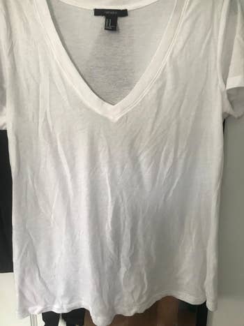 a reviewer's wrinkled T-shirt 