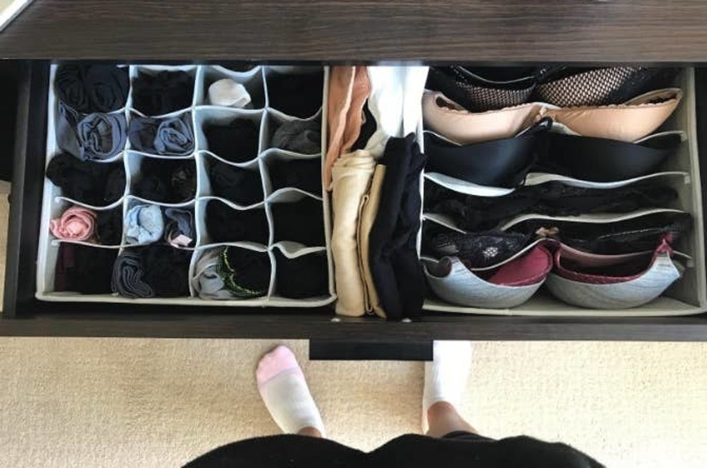A reviewer's organized drawer with socks and bras