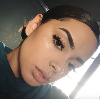 reviewer with matte makeup 