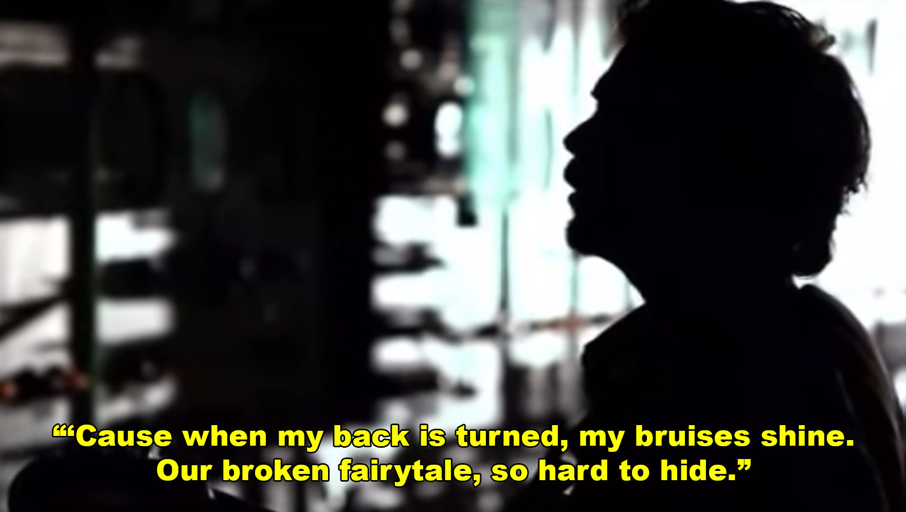 "Cause when my back is turned, my bruises shine. Our broken fairytale, so hard to hide."