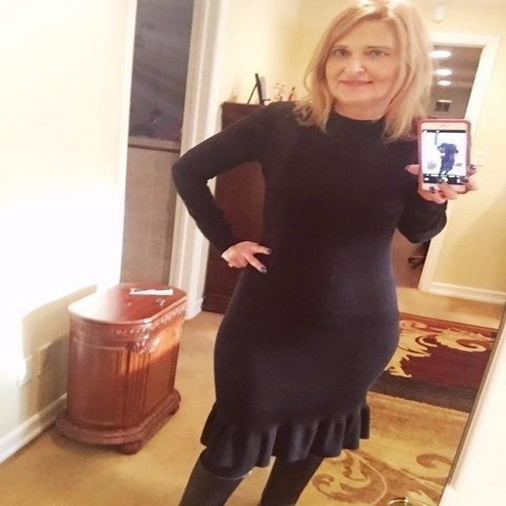 reviewer wears the dress