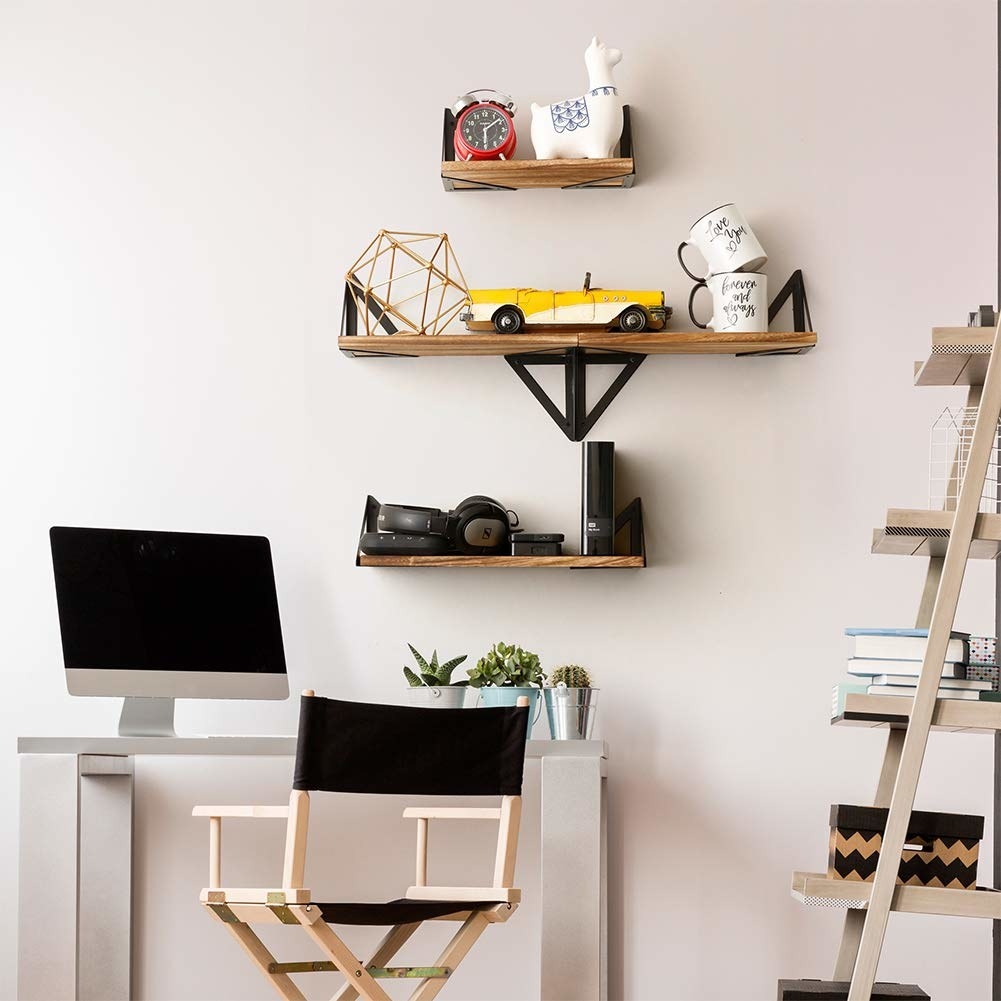 The wooden shelves mounted on the wall