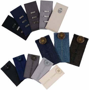 The extender tabs in black, navy, gray, light gray, cream, and three shades of denim with various hook and button closures