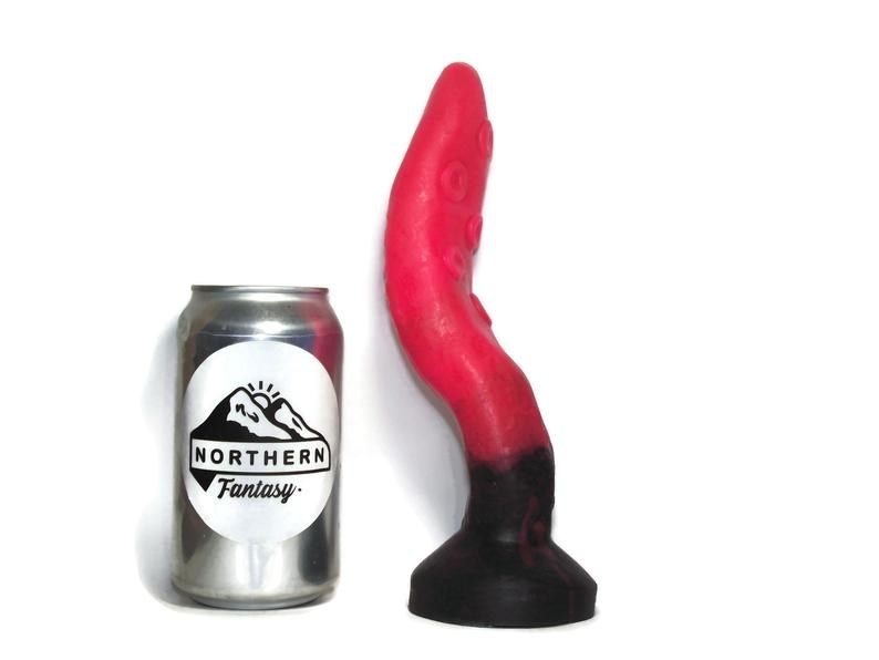 the textured tentacle dildo next to a soda can