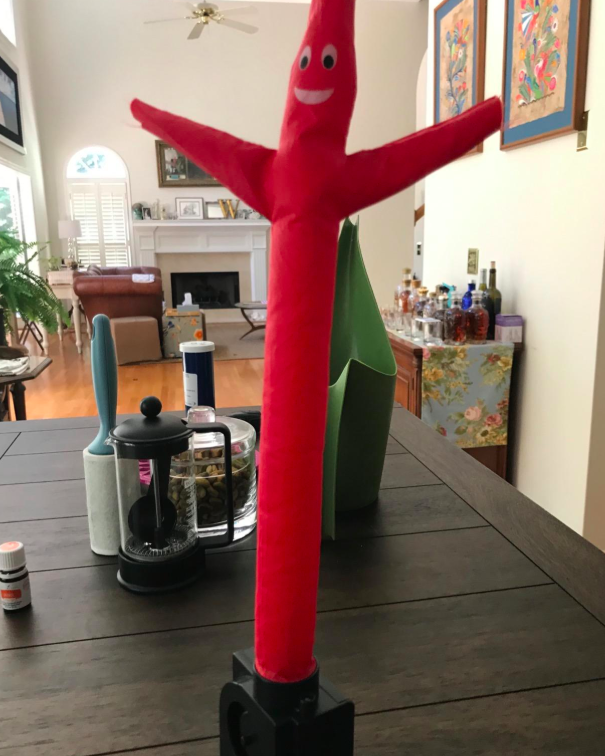 Inflatable tube man in living area 