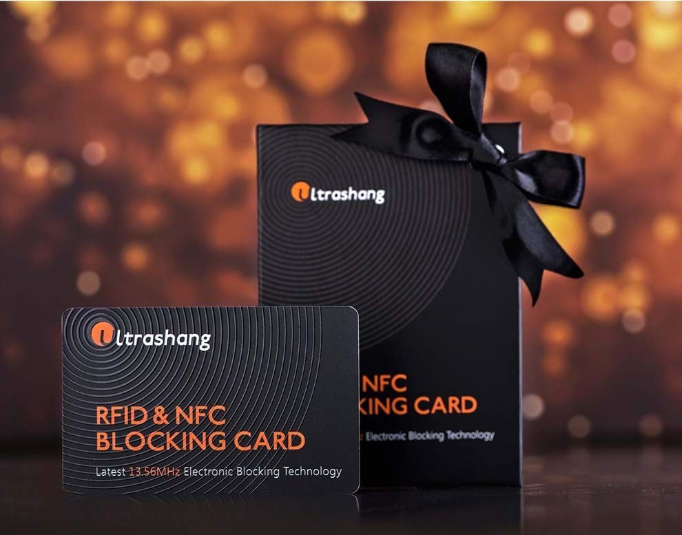 The RFID blocking card with twinkling lights in the background
