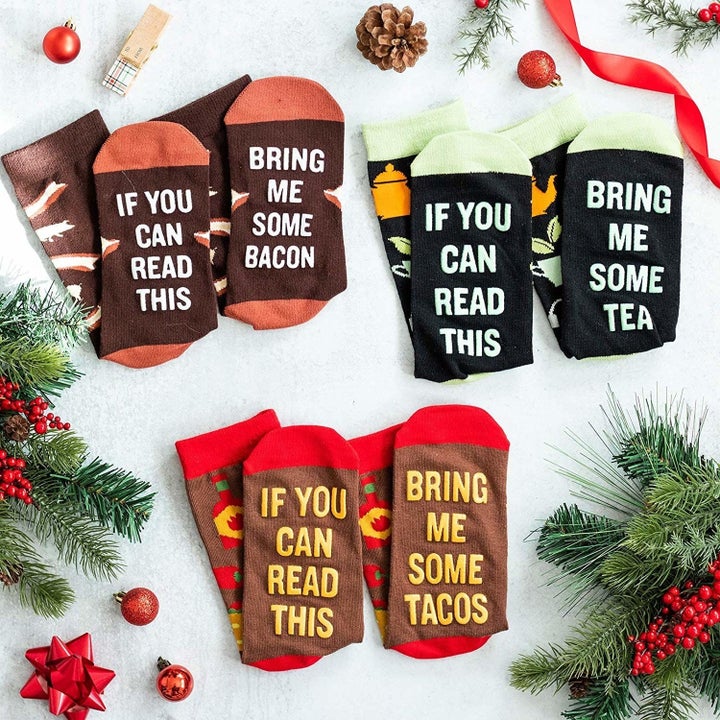 three pairs of socks, featuring bacon, tacos, and tea 