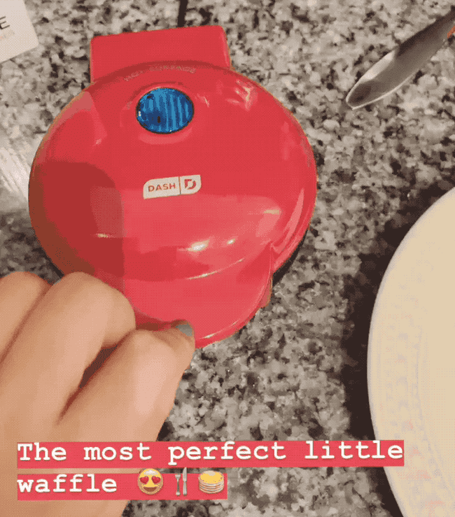 A gif of a BuzzFeeder making a waffle and the text 