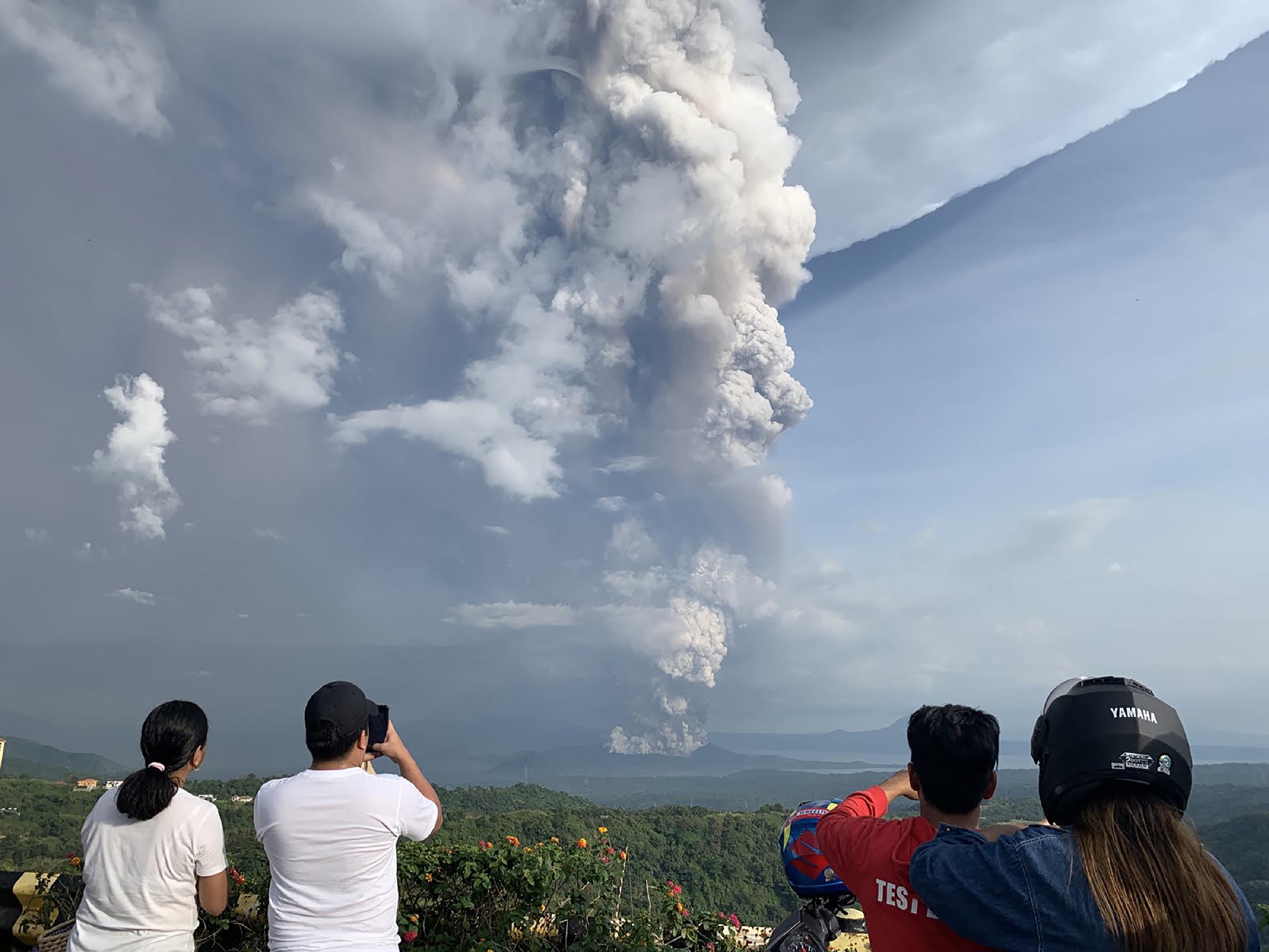 Photos Show Philippines' Taal Volcano Eruption, Thousands Forced To