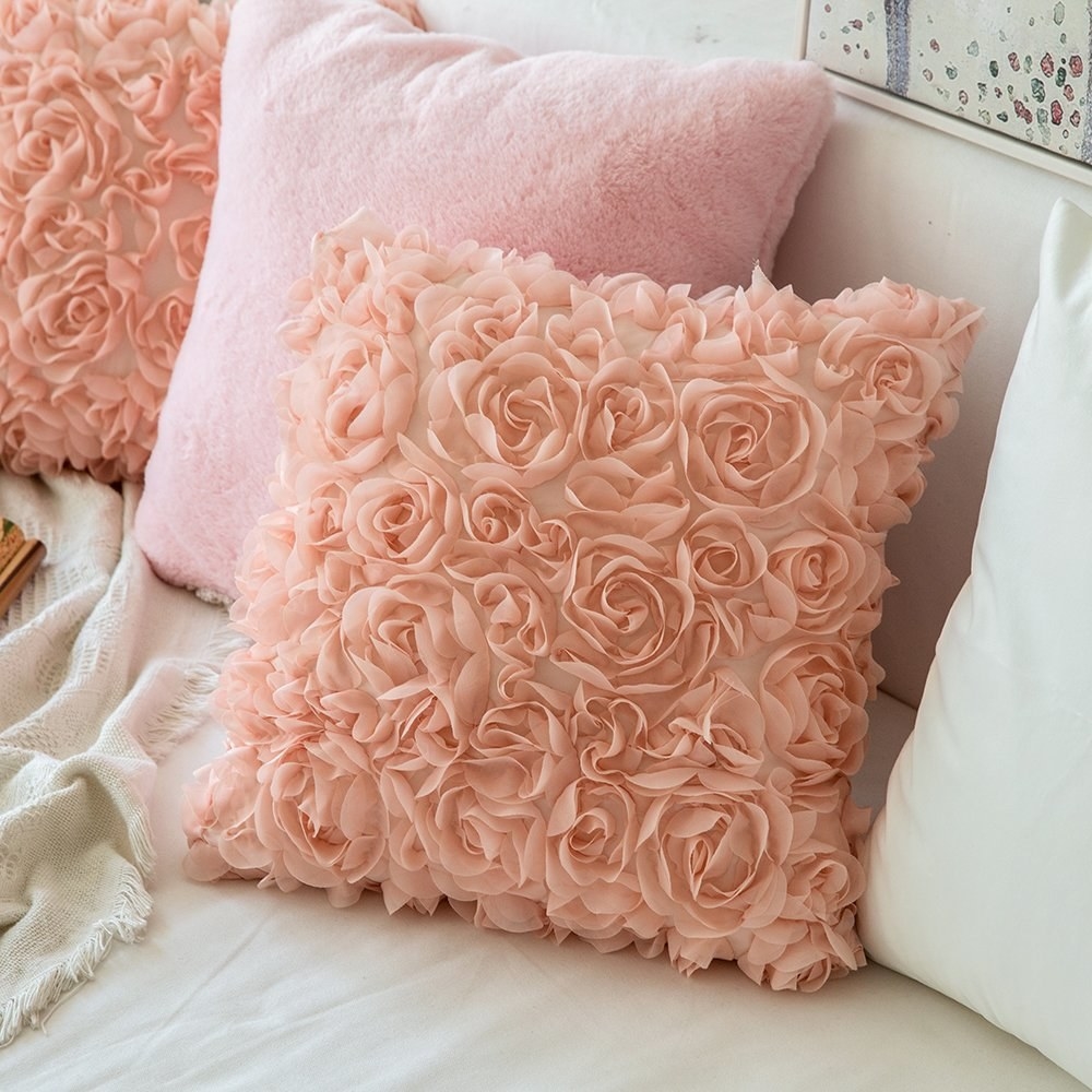 square pillowcase with raised fabric to look like roses all over it
