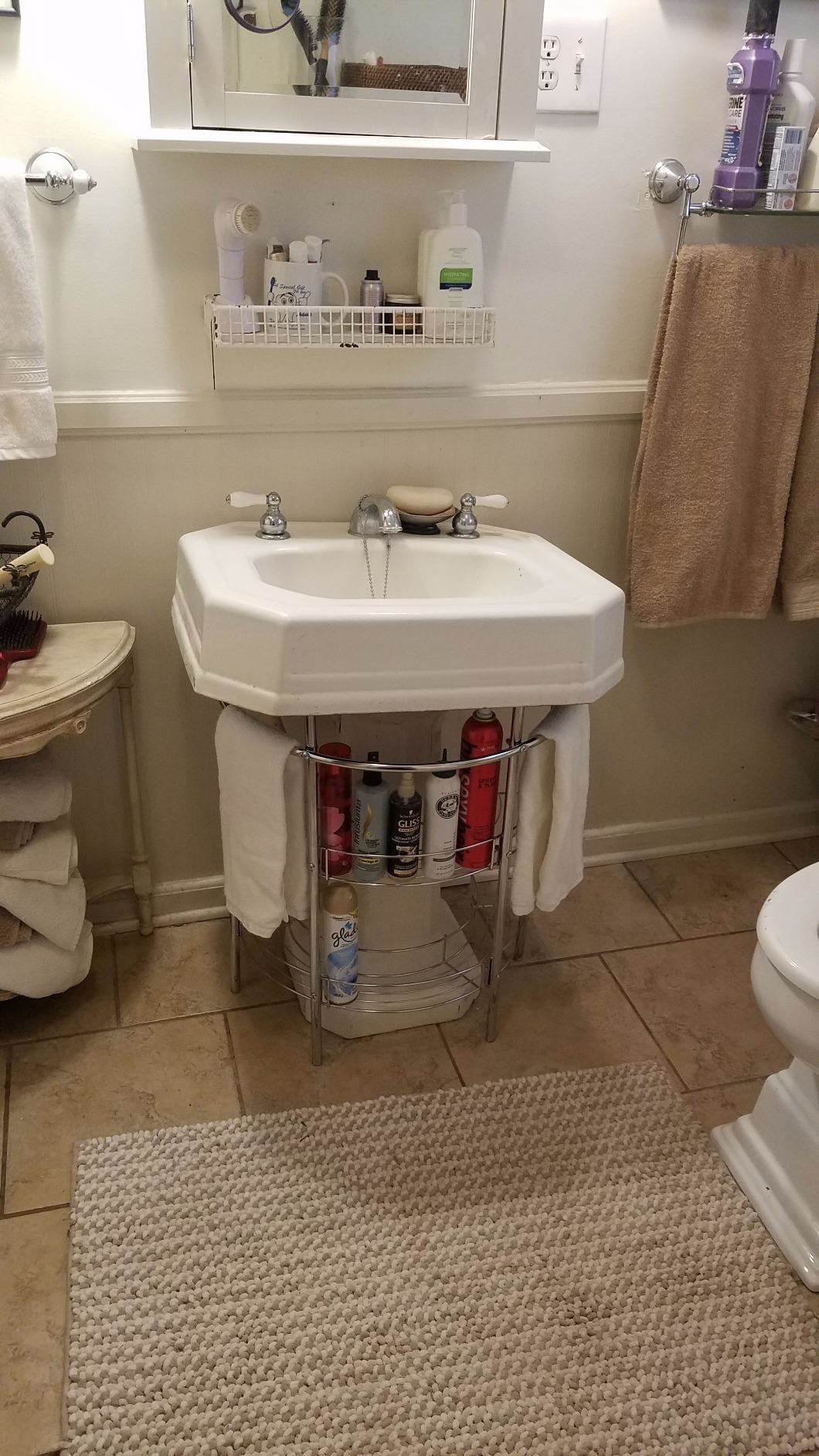 Storage under deals wall mounted sink