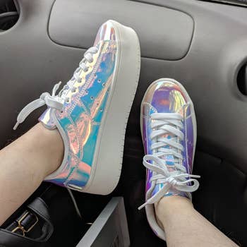 Reviewer photo of the iridescent shoes with with white laces
