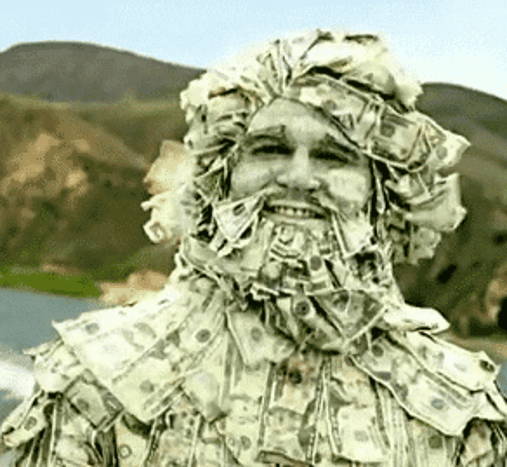 Person covered in dollar bills smiling 