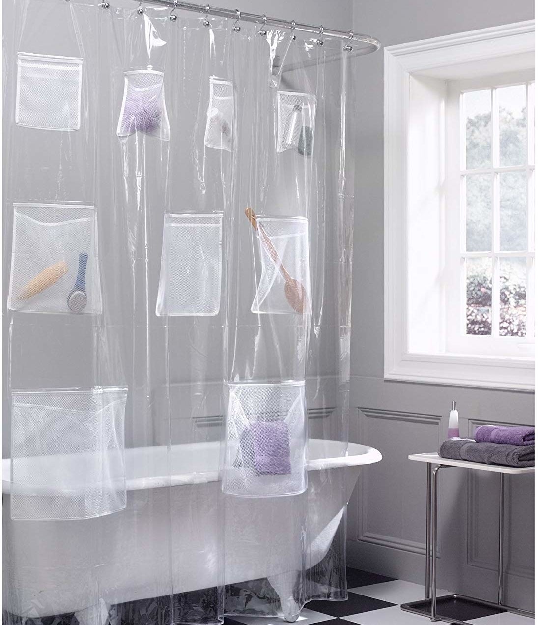 The shower curtain on a rod, filled with accessories and products