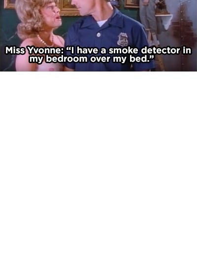 Miss Yvonne telling a fireman she has a smoke detector in her bedroom