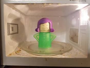 Angry Mama cleaner placed in dirty microwave